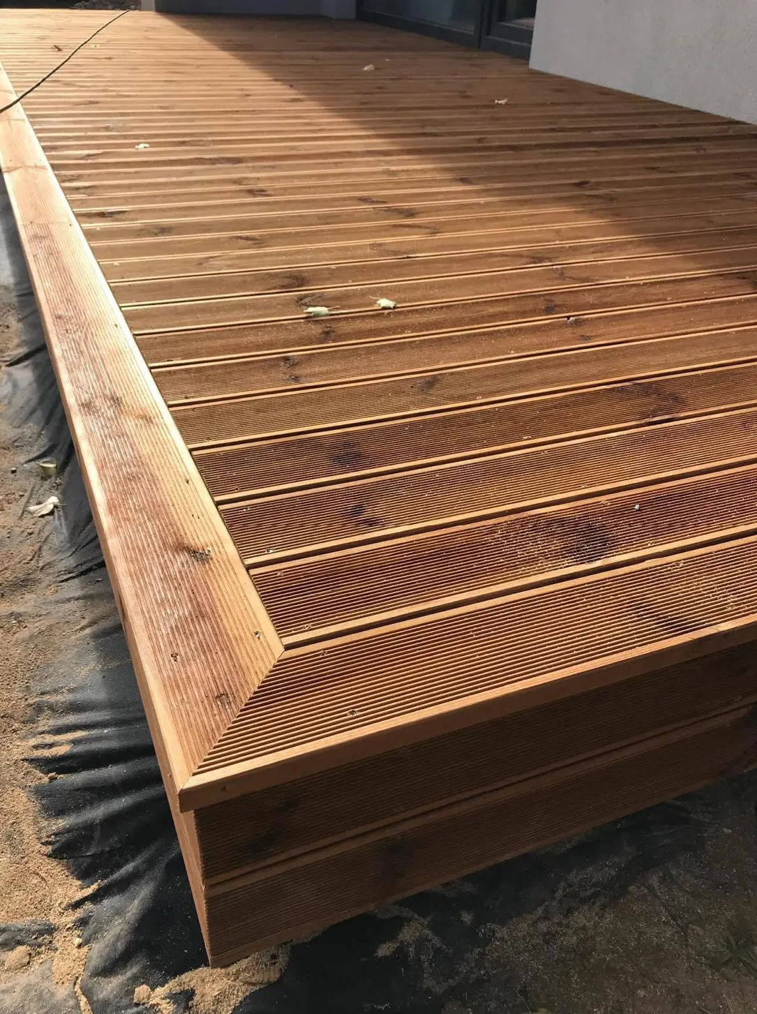 Timber Decking Seating Dyce Wrap-around garden deck with integrated seating in Dyce Aberdeen
